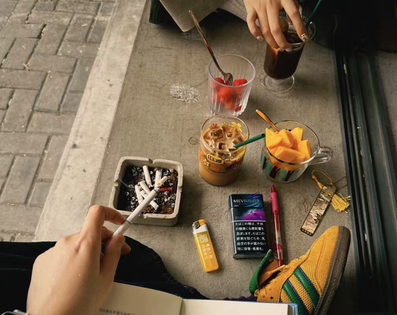 Relaxing on the street with a book