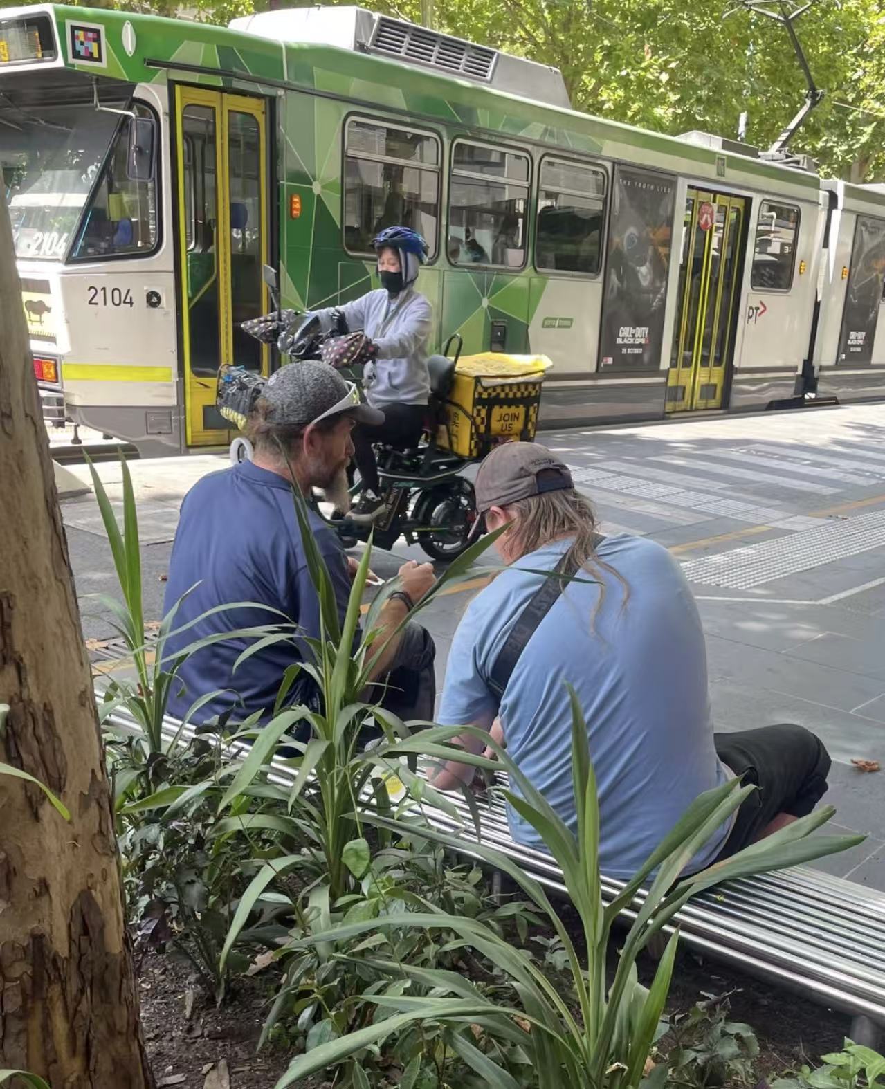 Two people having a smoko